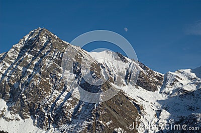 Snowy alpine mountains Stock Photo