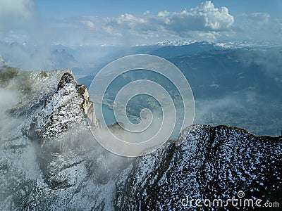 Snowy alpine peaks aerial by Wallensee Stock Photo