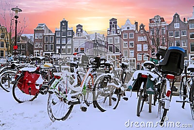 Snowy bikes in Amsterdam the Netherlands Stock Photo