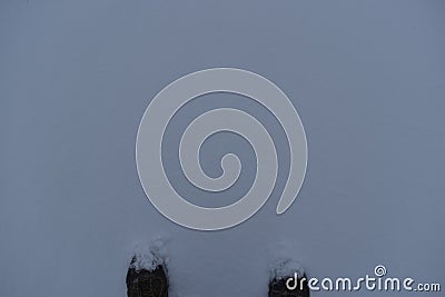 Snowy Boots in fresh deep snow Stock Photo