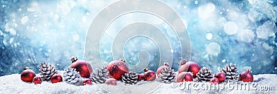 Snowy Christmas Balls And Pinecones Stock Photo
