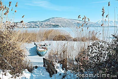 Snowy lake scene in Kastoria Greece Editorial Stock Photo