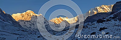 Snowy Landscape Panorama in Himalaya Mountains. Sunrise Annapurna South peak, Annapurna Base Camp . Stock Photo