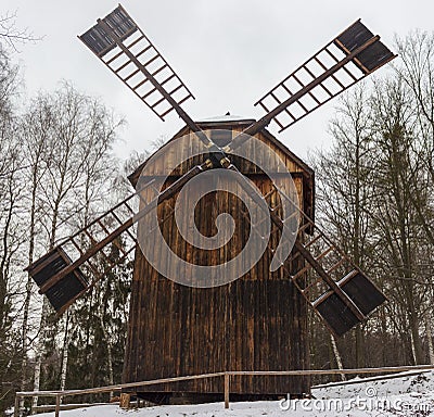 Snowy landscape with retro windmill Stock Photo