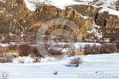 Snowy landscape from the train window. View from the window of the Eastern Express. Stock Photo