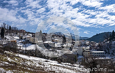 Snowy landscapes. Village in Lake Plastira on winter. Greece Stock Photo
