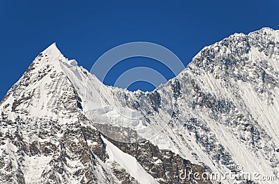 Snowy mountain peak - beauty of nature Stock Photo