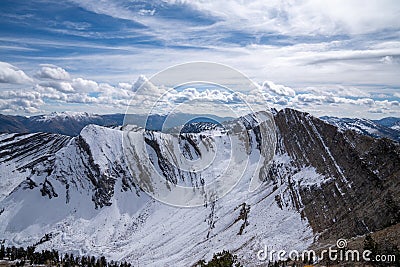 Snowy mountain ridges in the Bridger-Teton National Forest of Wyoming, on a summit Stock Photo