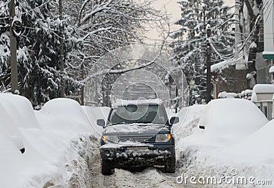 Snowy off road vehicle Stock Photo