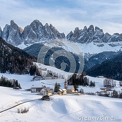 Snowy panorama at Santa Magdalena village in the famous Val di Funes. Trentino Alto Adige, Italy. Stock Photo