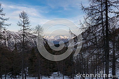 Snowy panorama of the Val Bognanco that opens behind Domodossola, Piedmont Stock Photo