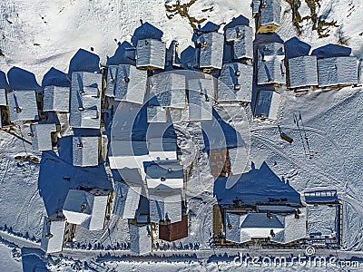 Snowy roofs in an alpine village Stock Photo