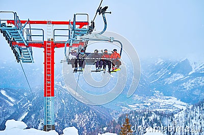 Snowy scenery with riding chairlift, Feuerkogel mount, Ebensee, Salzkammergut, Austria Stock Photo