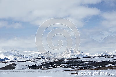 Snowy Scenic Point and Rising Wolf Mountain in Powder Blue Stock Photo