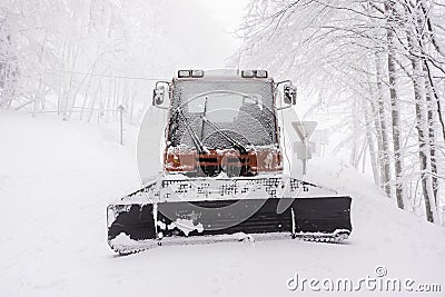 Snowy Snow plow Stock Photo