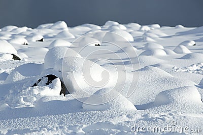 Snowy volcanic rocks in Iceland Stock Photo