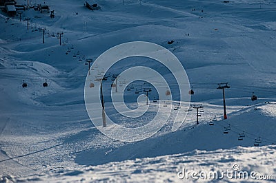 Snowy winter mountains in sun day. Georgia, from ski resort Gudauri. Stock Photo