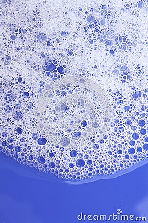 Soap Bubbles on Blue Stock Photo