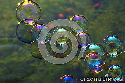 Soap bubbles on water Stock Photo