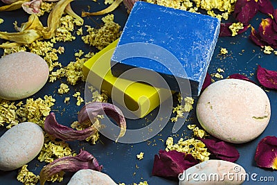 Soap and dry flowers and rocks, aroma and body care therapy Stock Photo