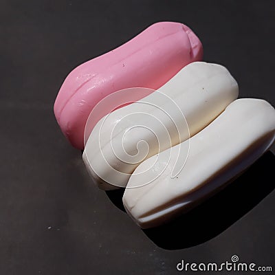 Pink and white soap on the black background Stock Photo