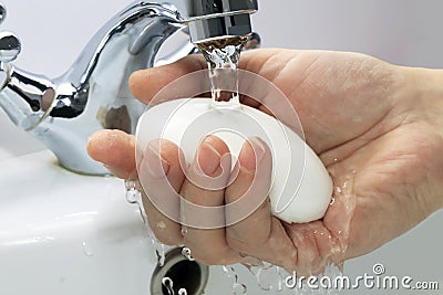 Soap in hand Stock Photo