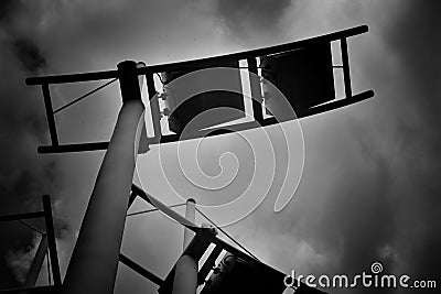 Soaring pylons carrying stadium lights Stock Photo