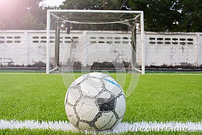 Soccer ball on Artificial turf football field green white grid Stock Photo