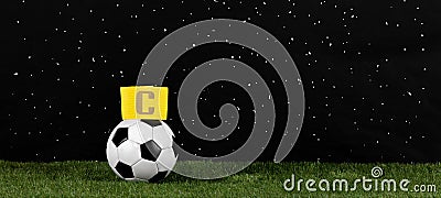 soccer ball and captain armband, football Stock Photo
