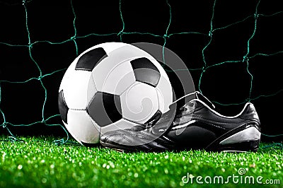 Soccer ball and cleats Stock Photo