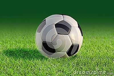 Soccer ball close up on grass lawn. Stock Photo