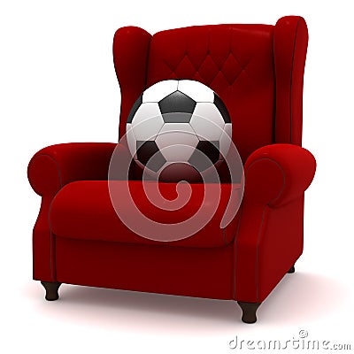 Soccer ball in easy chair Stock Photo