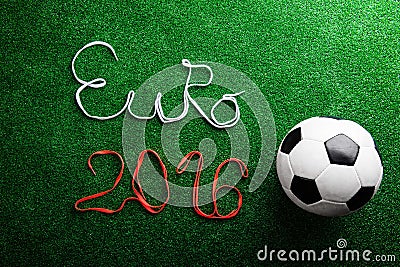 Soccer ball and Euro 2016 sign against artificial turf Editorial Stock Photo