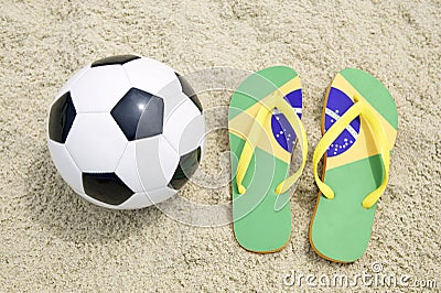 Soccer Ball Football and Flip Flops on Brazilian Beach Stock Photo