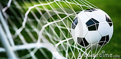 Soccer ball in goal Stock Photo