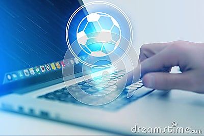 Soccer ball icon over device - Sport and technology concept Stock Photo