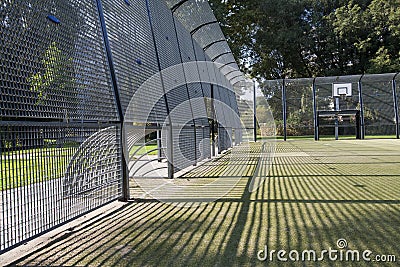 Soccer and basketball cage Stock Photo