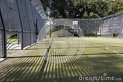 Soccer and basketball cage Stock Photo