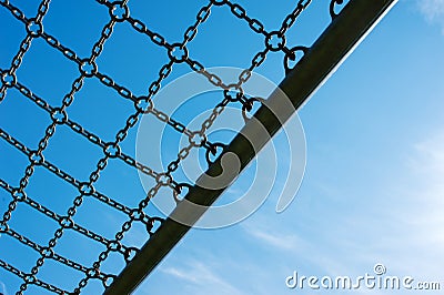 Soccer cage goal, blue sky, football for kids Stock Photo