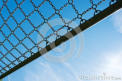 Soccer cage goal, blue sky, football for kids Stock Photo