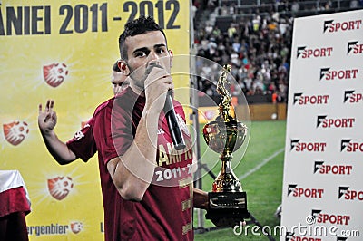 Soccer captain with golden cup Editorial Stock Photo