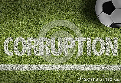 Soccer field with the text: Corruption Stock Photo
