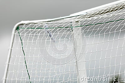 Soccer football equipment background. White soccer net on a goal. Stock Photo