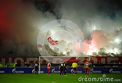 Soccer or football fans using pyrotechnics Editorial Stock Photo