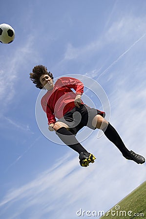 Soccer Football Player making Header Stock Photo