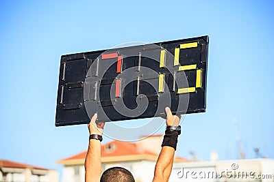 Soccer football referee assistant with board substitution Stock Photo