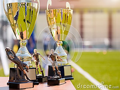 Football Trophies, Awards. Golden Cups and Kids Football Trophies Editorial Stock Photo