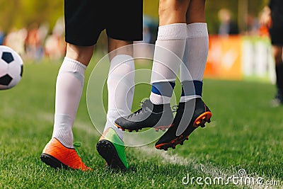 Soccer Free Kick. Players Sranding in a Football Wall. Feet of Footballers Jumping Up in a Wall. Players in Sports Cleats and Whte Stock Photo