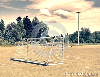 The Soccer Goal in summer. Empty training gate for classic fotbal on green grass Stock Photo