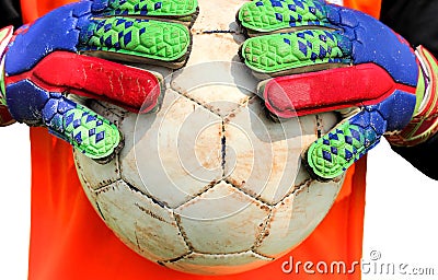 Soccer goalkeeper catching ball with hands Stock Photo